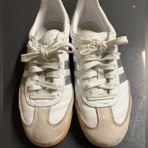 White and silver adidas samba